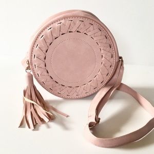 Pink woven round bag with hassle